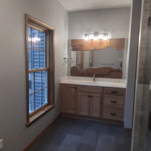 Master bathroom with live-edge mirror and custom vanity in Elverson, PA