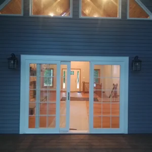 Double deck doors into the great room at dusk in Elverson, PA