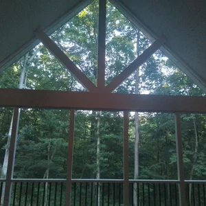 Timber-frame gable over the rear screened porch in Elverson, PA
