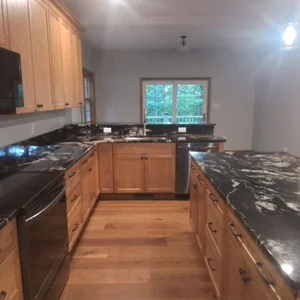 Custom cherry kitchen cabinets with granite island in Elverson, PA