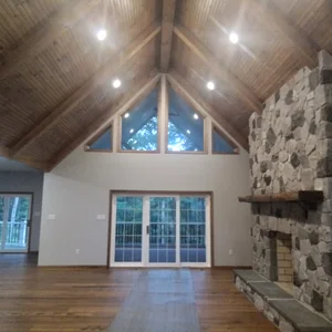 Great room with cathedral ceiling and stone fireplace in Elverson, PA