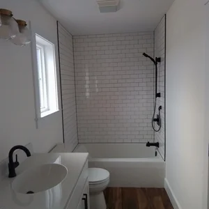 Guest bathroom with tiled shower