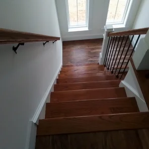 Wooden Staircase leading to downstairs area