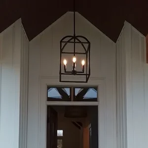 Outdoor entrance with chandelier
