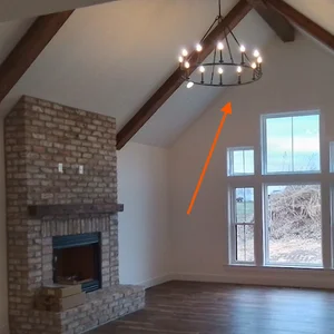 Farmhouse living room with a chandelier