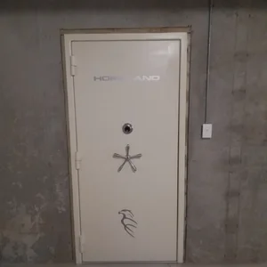 A secure firearms vault with the door closed