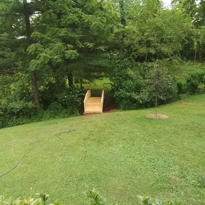 Backyard bridge connecting the lawn to the rear acreage in Phoenixville, PA