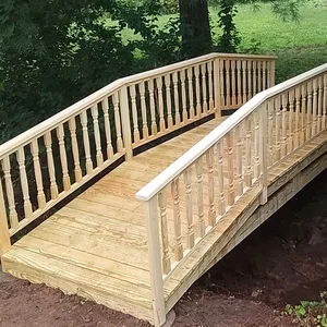 Picket balusters and handrail on a backyard footbridge in Phoenixville, PA