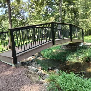 Composite bridge deck and stone abutment along the mulch approach path in Malvern, PA