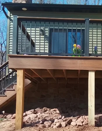 Selection of premium Amish decking materials including high-end composite and exotic hardwood