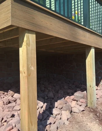 Safety and style with new wood deck railing as an Amish-built feature