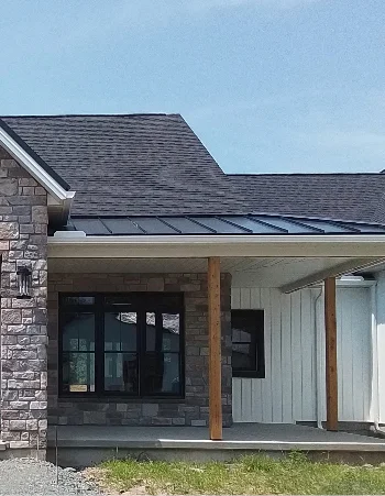 Amish crew performing detailed gutter repair and maintenance on a residential property