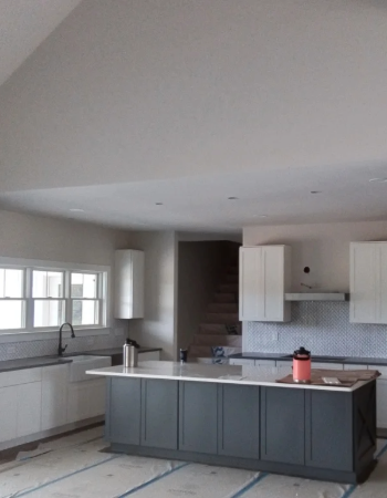 Finished kitchen remodeling showcasing new appliances and detailed trim work by Amish builders