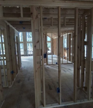 Interior basement framing showing straight walls and structural support for renovations in Frazer, PA