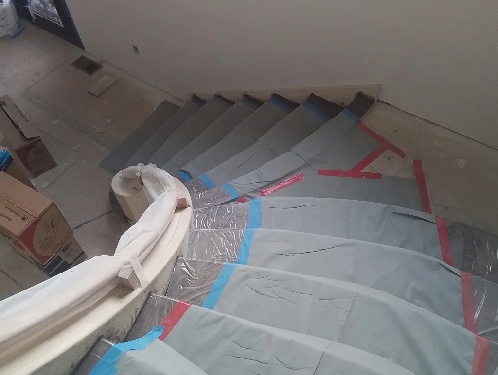 Straight to Curved Staircase Conversion - Sunny Ridge Construction