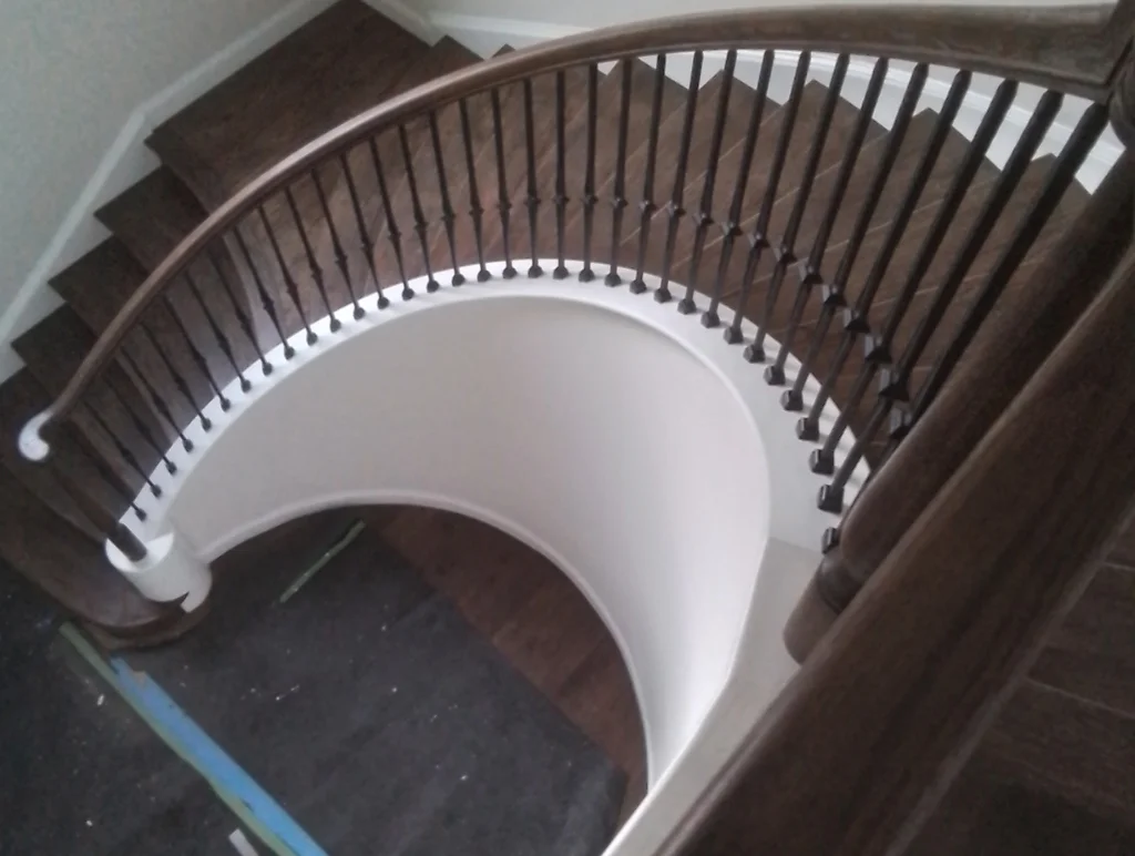 Curved Staircase After - Sunny Ridge Construction