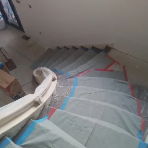 Straight to Curved Staircase Conversion - Sunny Ridge Construction